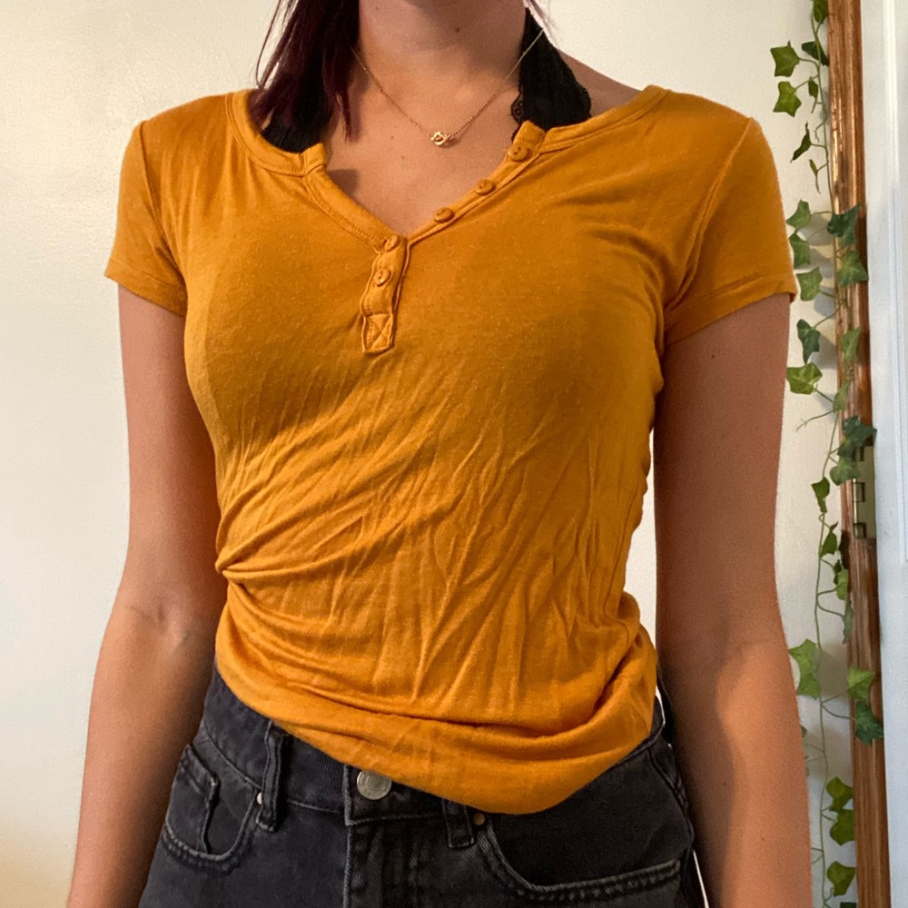 gold button down top